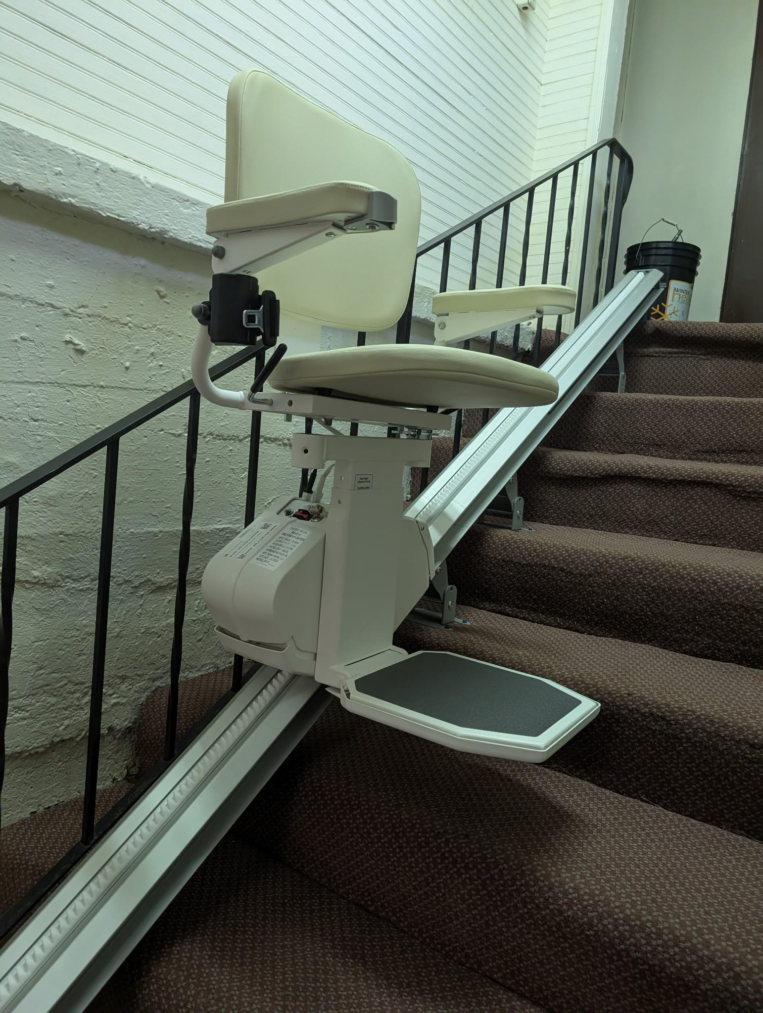 Outdoor stair lift installed on exterior home steps in Cleveland Ohio with weather-resistant rail
