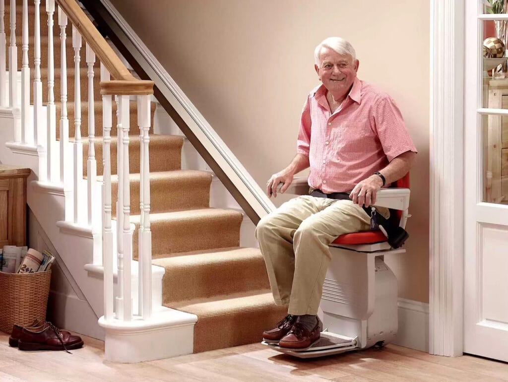 Safe stair lift installation helping senior adult move between floors independently